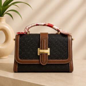 Monogram Embossed Top-Handle Handbag Black & Tan